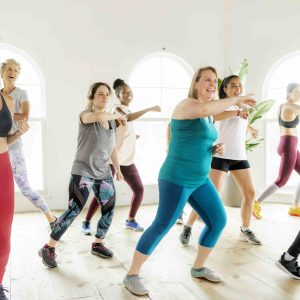 People dancing in a fitness class
